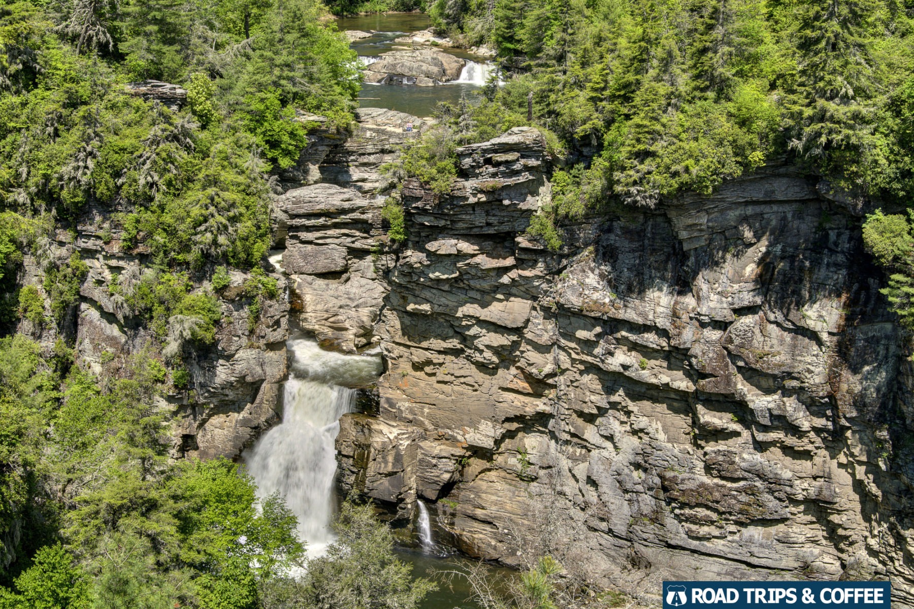 The towering Linville Falls spills over the edge into the ravine below on the Blue Ridge Parkway in North Carolina